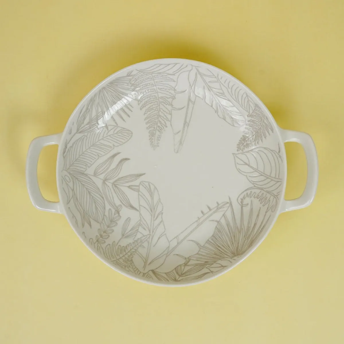 Round porcelain platter with grey botanical border design
