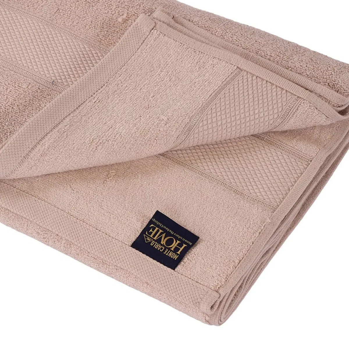 Close-up of the towel's soft texture and decorative border
