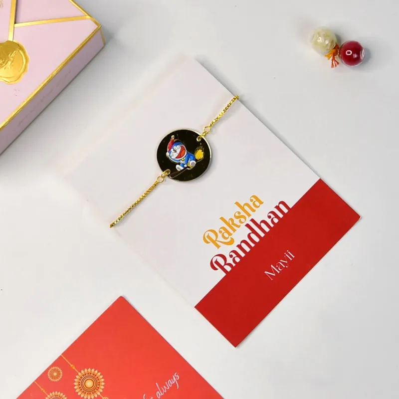 Close view of a rakhi with cartoon motif placed on a Raksha Bandhan card