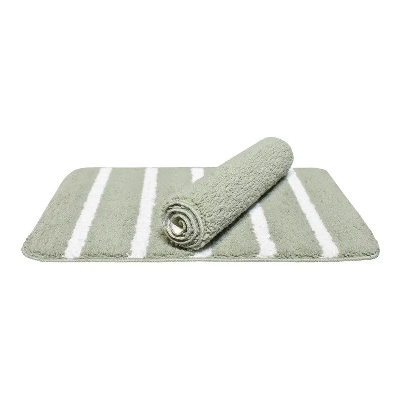 Rolled green and white striped rectangular bath mat on a white background