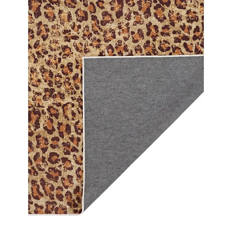 Back corner of the leopard-pattern carpet showing the underside