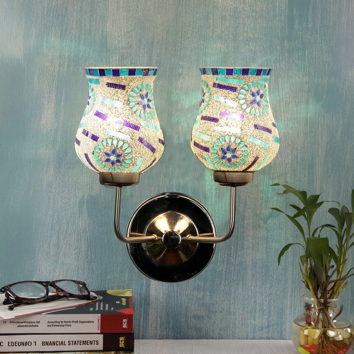 Lit multicolour mosaic glass wall lamp with two upward shades