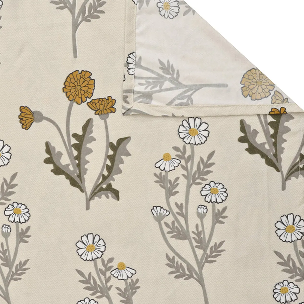 Folded corner of floral diwan bedsheet showing the printed surface