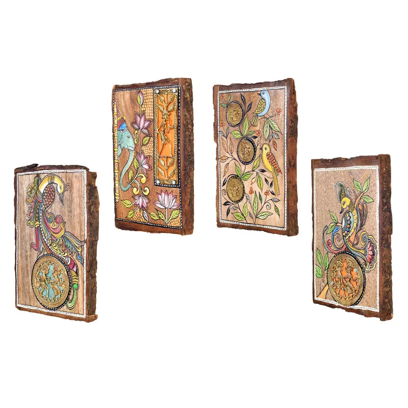 Angled view of four framed wood wall paintings featuring colourful birds and motifs