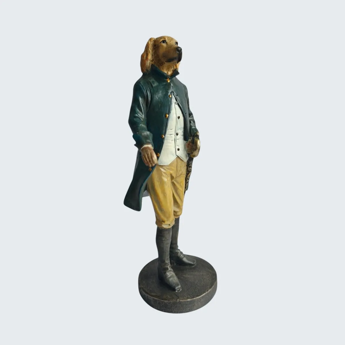 Front angled view of the dog gentleman figurine on a round base