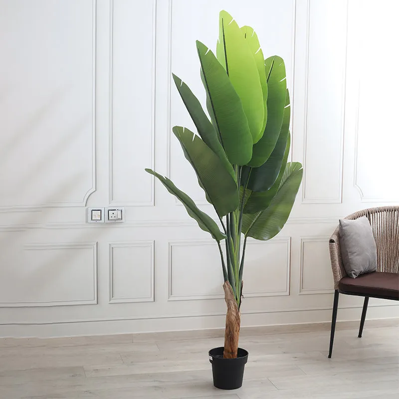 Artificial green leaf plant styled in a contemporary living room