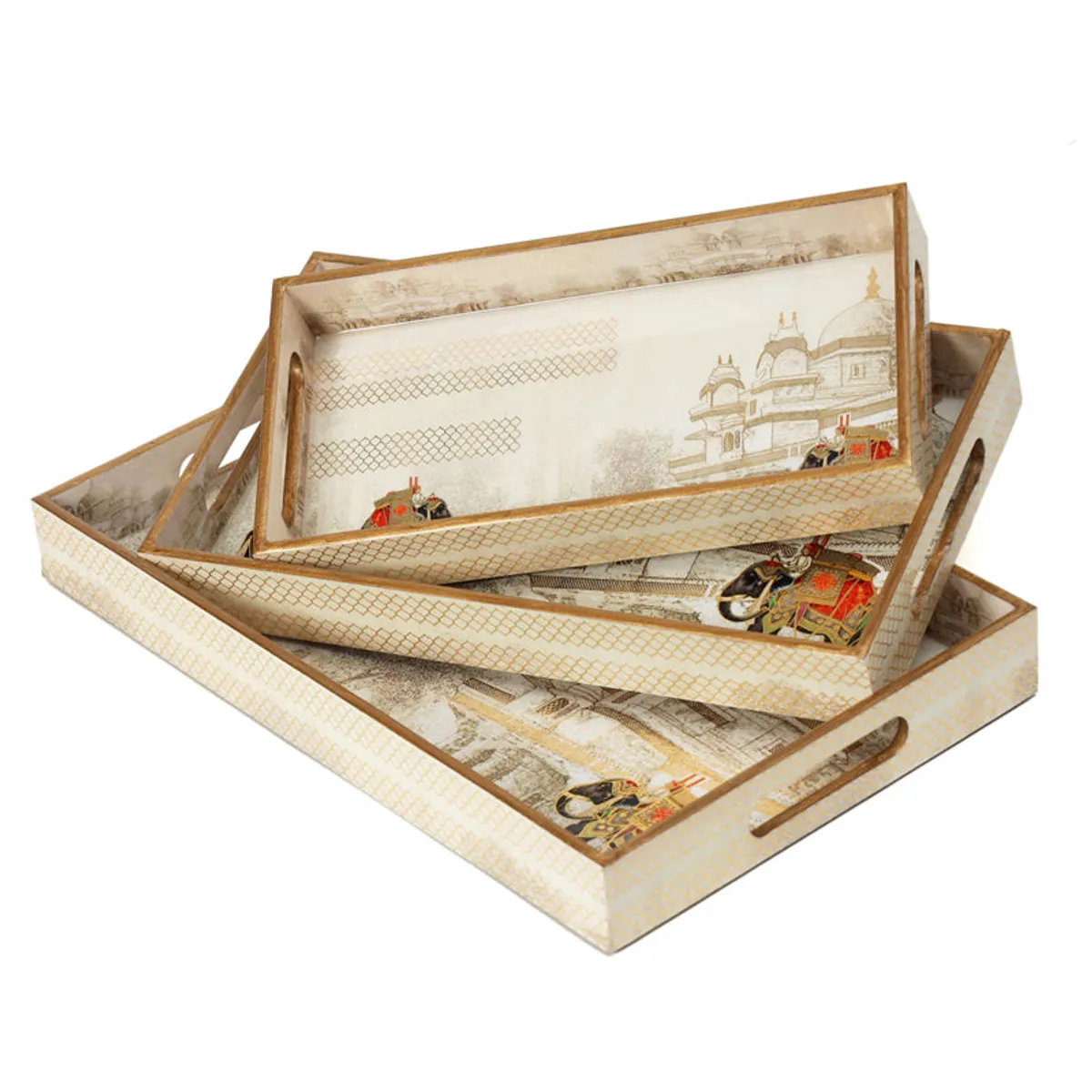 Three graduated ivory serving trays stacked together with elephant motifs