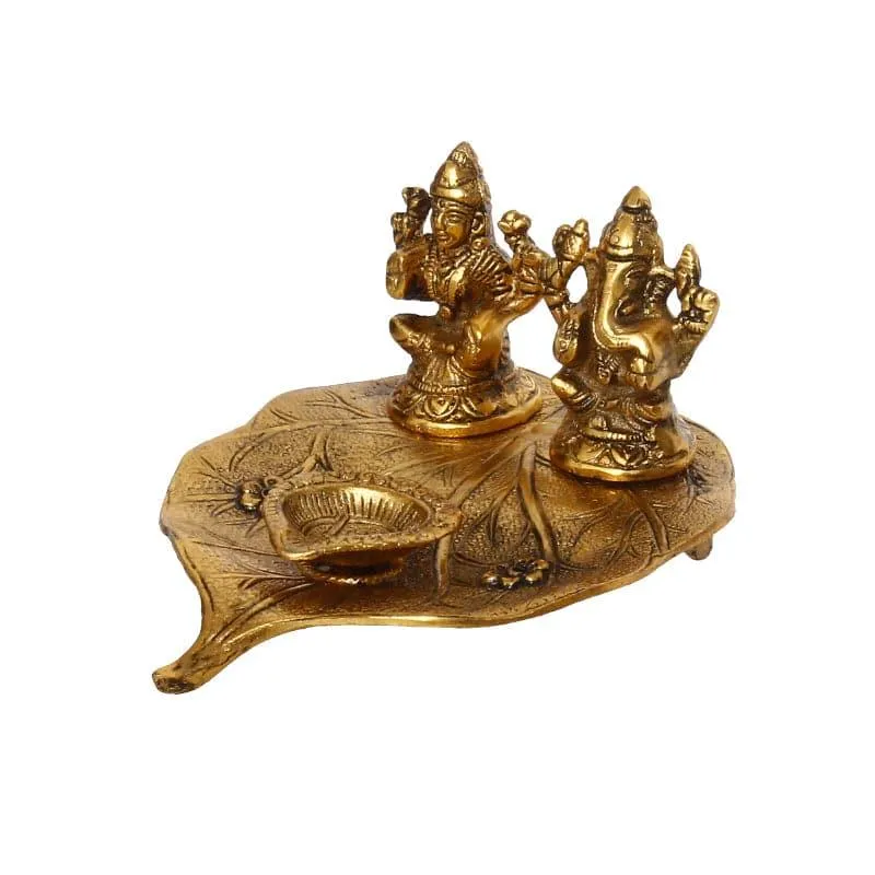 Sacred Lakshmi Ganesha Idol Metal Diya Stand - Gold media 3