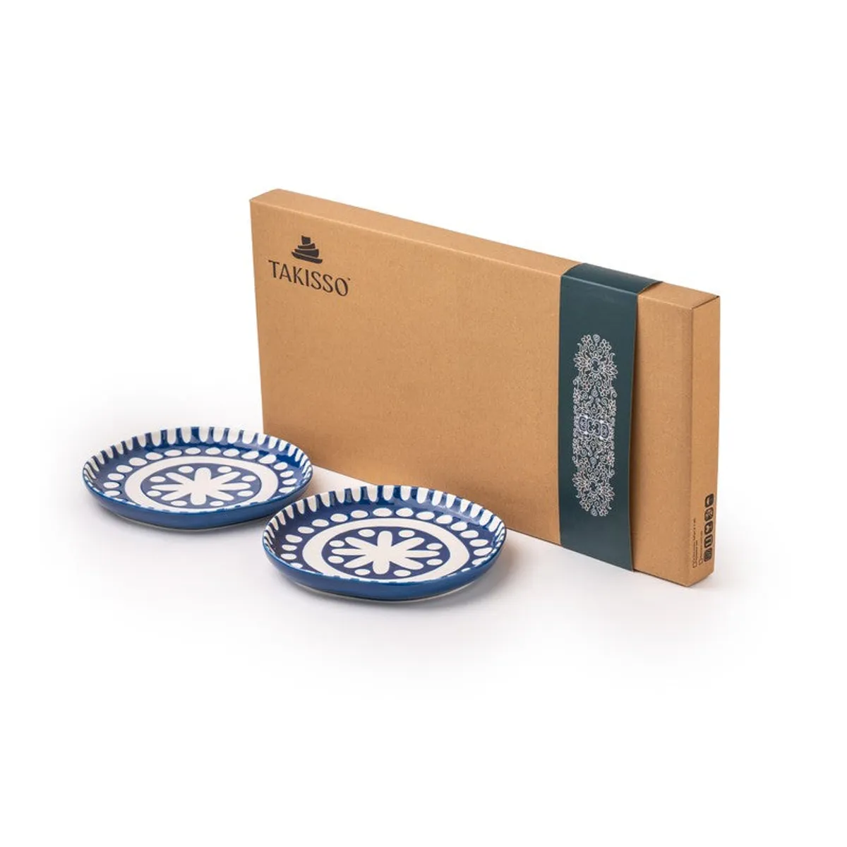 Close overhead view of a blue and white geometric patterned quarter plate