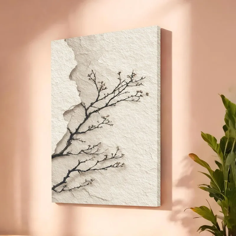 Side view of textured beige canvas wall art with dark branch design on a blush wall