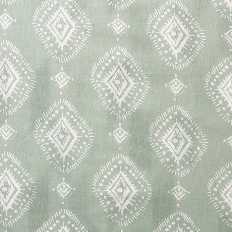 Close-up of the olive green dohar with white ethnic diamond motifs