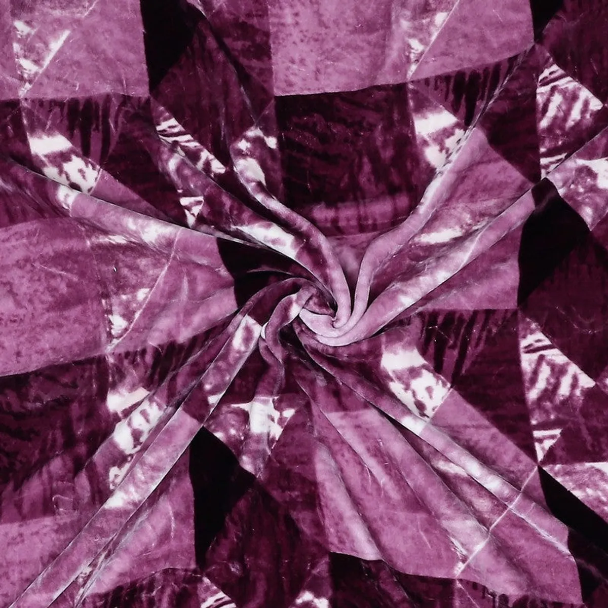 Detail of the soft purple blanket fabric gathered into folds
