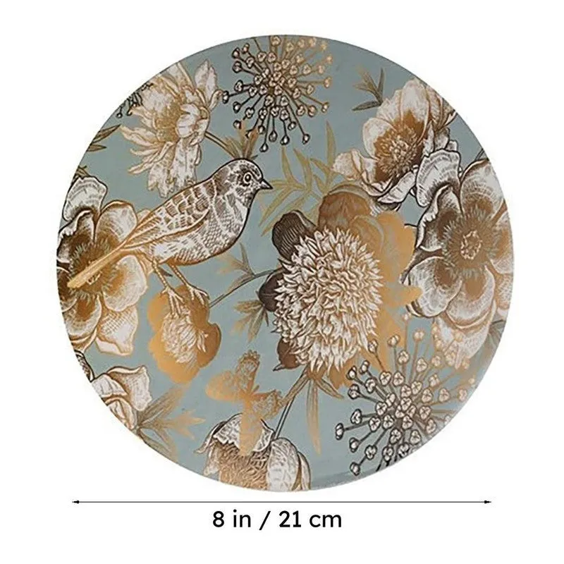 Round floral and bird table mat shown from above