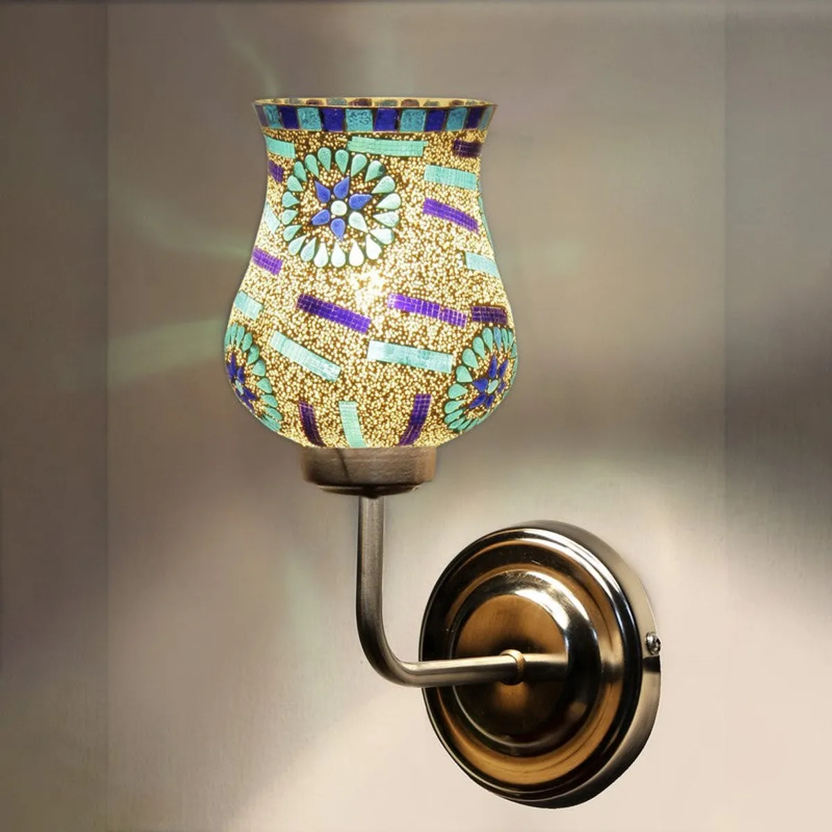 Lit mosaic glass wall lamp with curved steel arm
