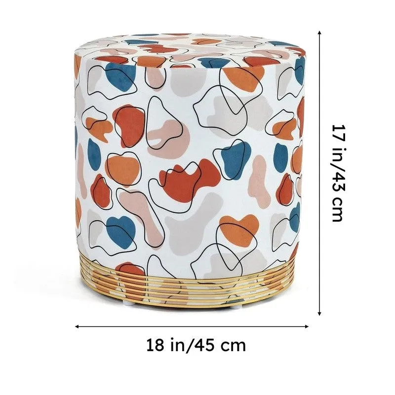 Round abstract-patterned pouffe shown from an angled view