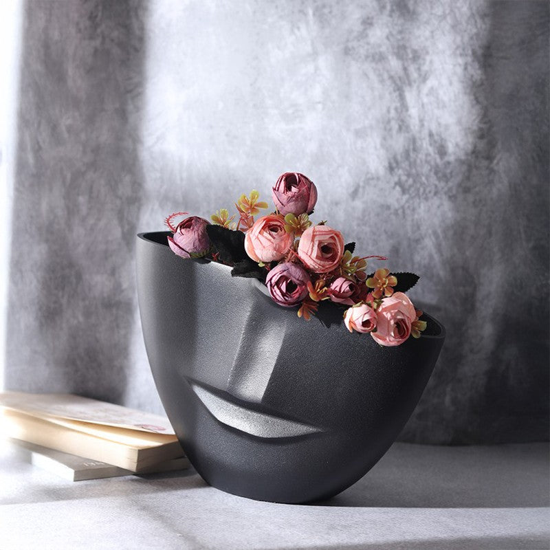 The amused Face Vase