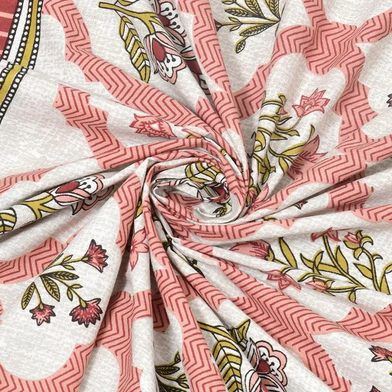 Close-up of the bedsheet fabric with peach floral print