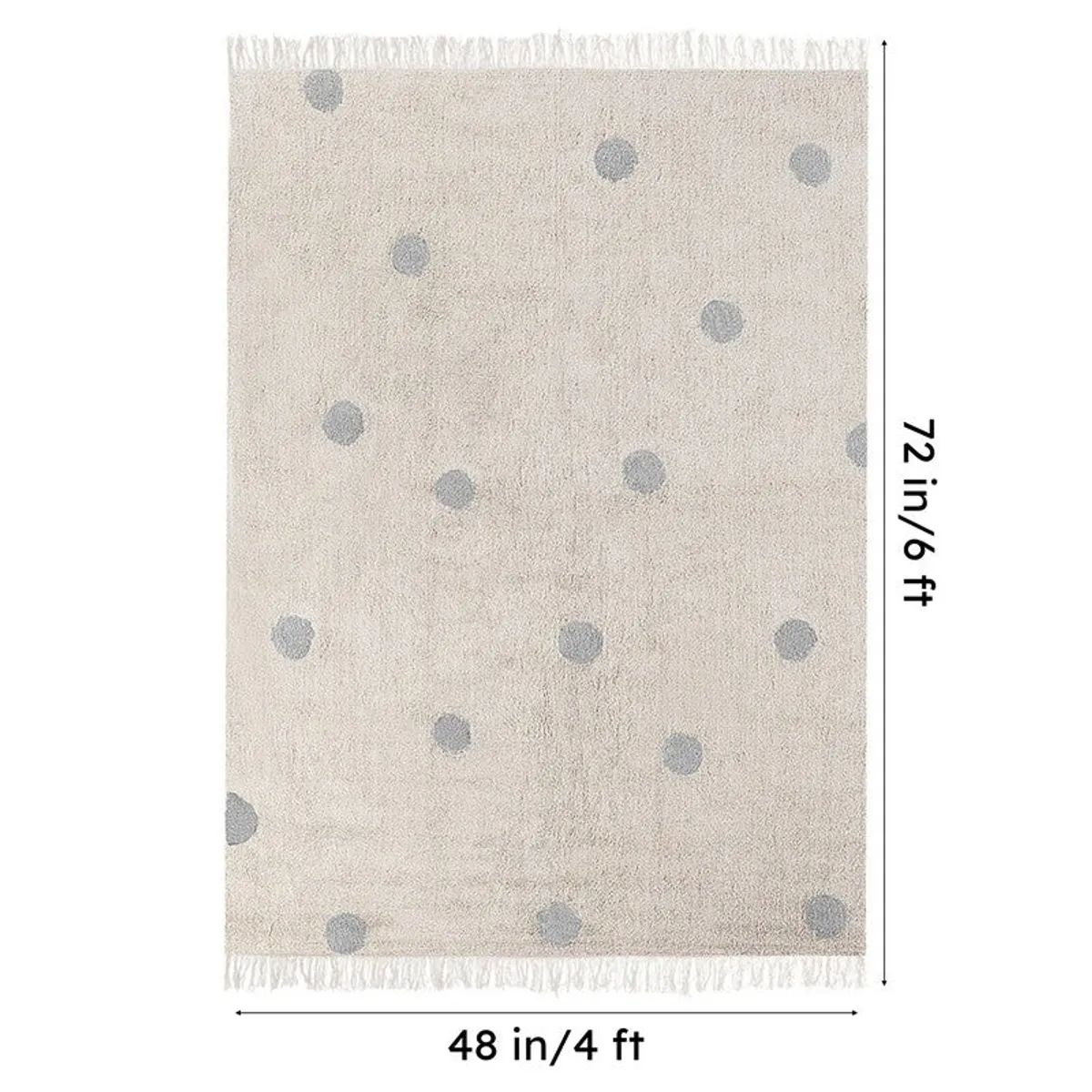 Full rectangular polka dot rug shown with fringed edges