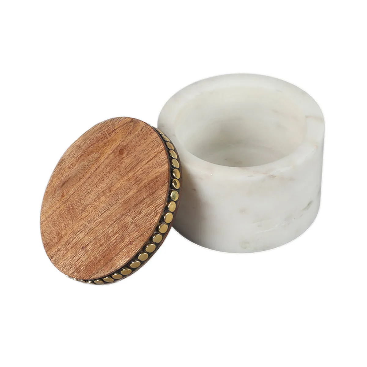 Open white marble jar with round brown wood lid and brass detailing