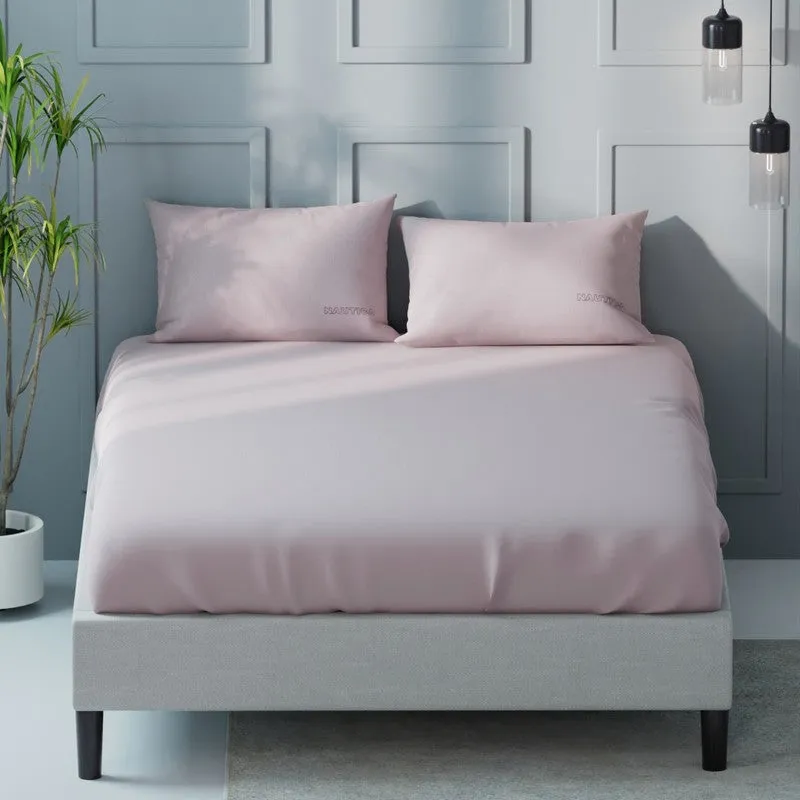Front view of a pink solid King bedsheet and two pillow covers