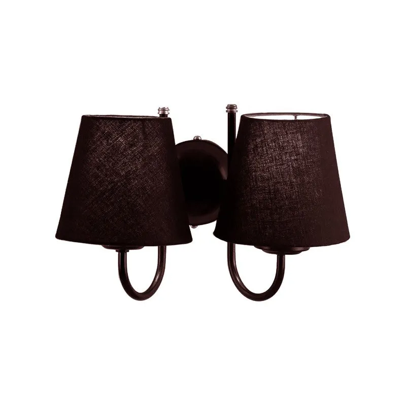 Studio view of a black twin-shade wall lamp
