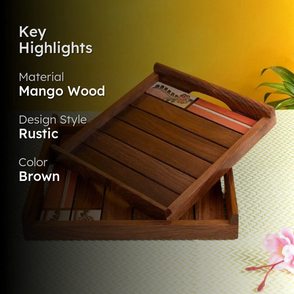 Two brown wooden serving trays styled against a warm yellow backdrop