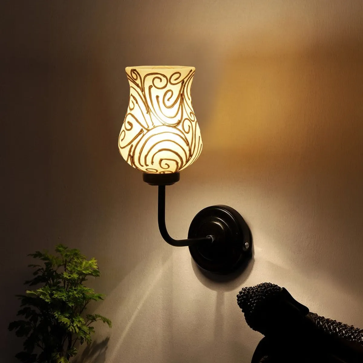 Glowing wall lamp casting warm light on the wall