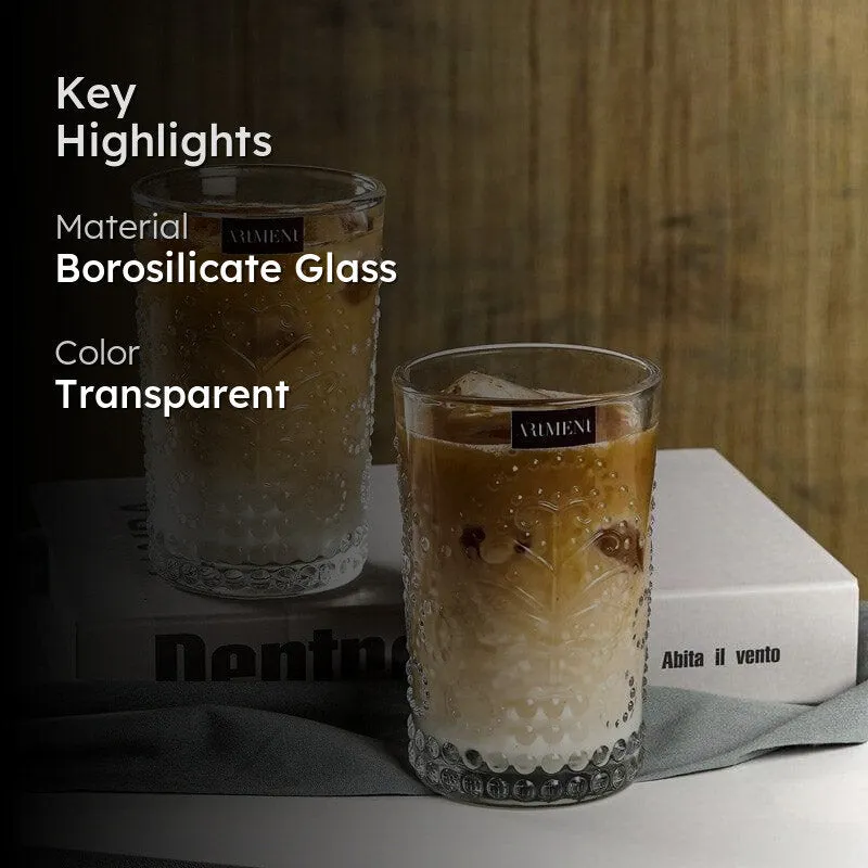 Clear embossed glass with drink shown beside key highlights text