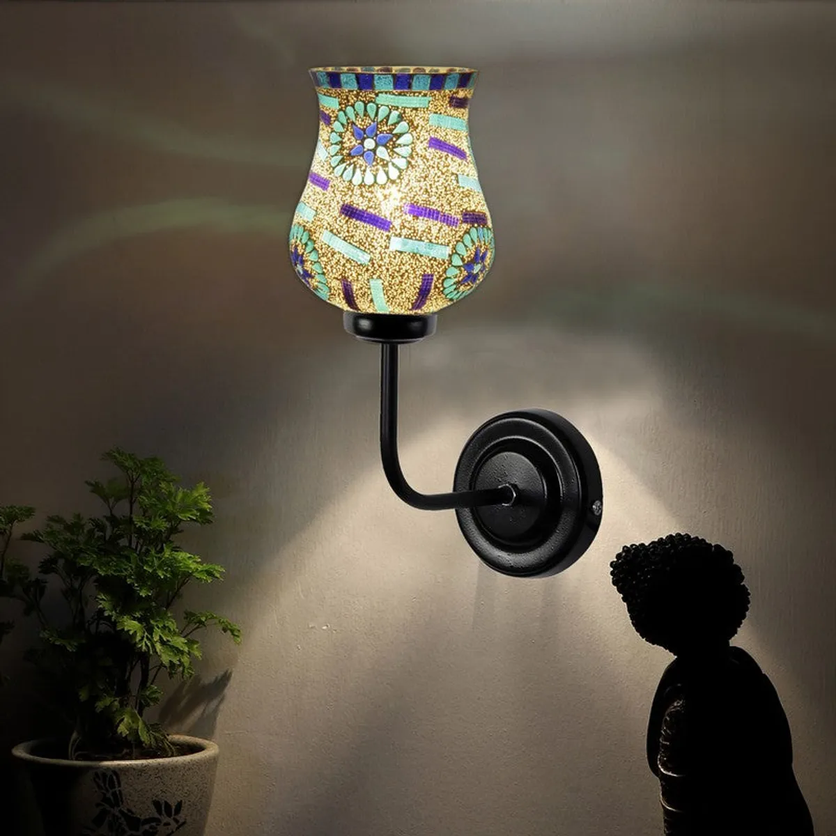 Glowing wall lamp casting soft patterned light on the wall