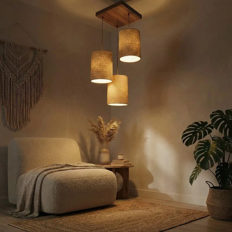 Three-shade cluster ceiling lamp lit in a warm setting