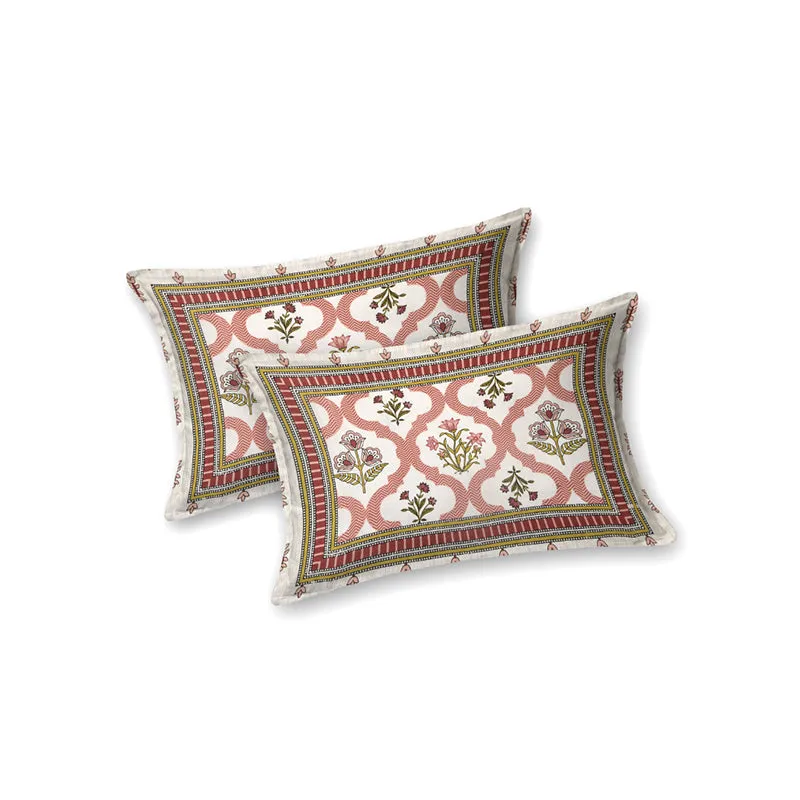 Two matching pillow covers with peach floral and ethnic pattern