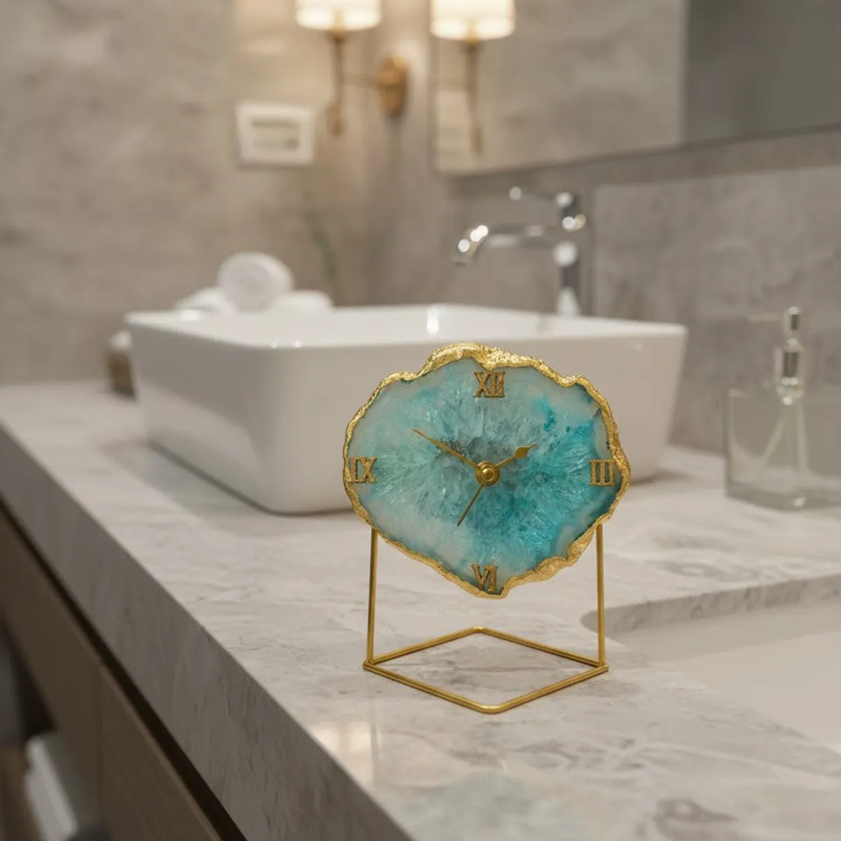 Turquoise agate table clock with gold stand placed on a bathroom counter