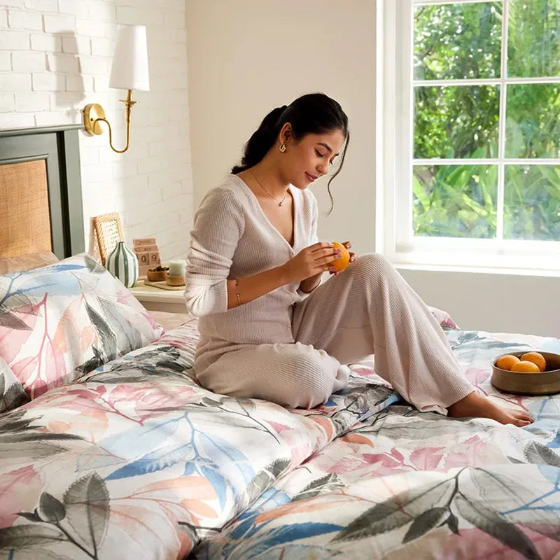 Bedroom styled with the white botanical duvet cover and colourful leaf print