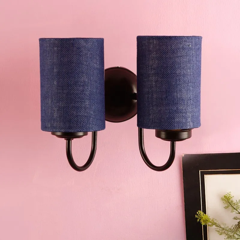 Unlit navy blue jute wall lamp with two cylindrical shades