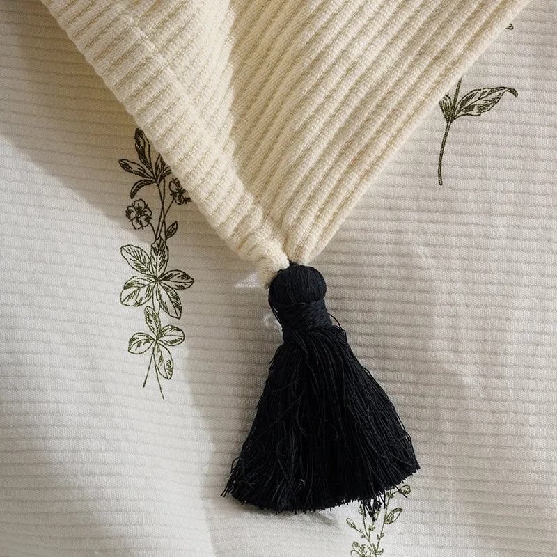 Nestlin Tassled Throw - Ivory & Black media 4
