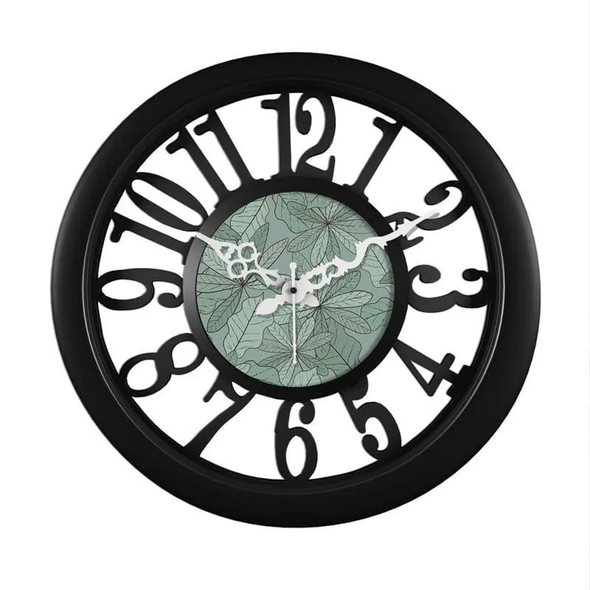 Close-up of black analogue clock with leafy green centre
