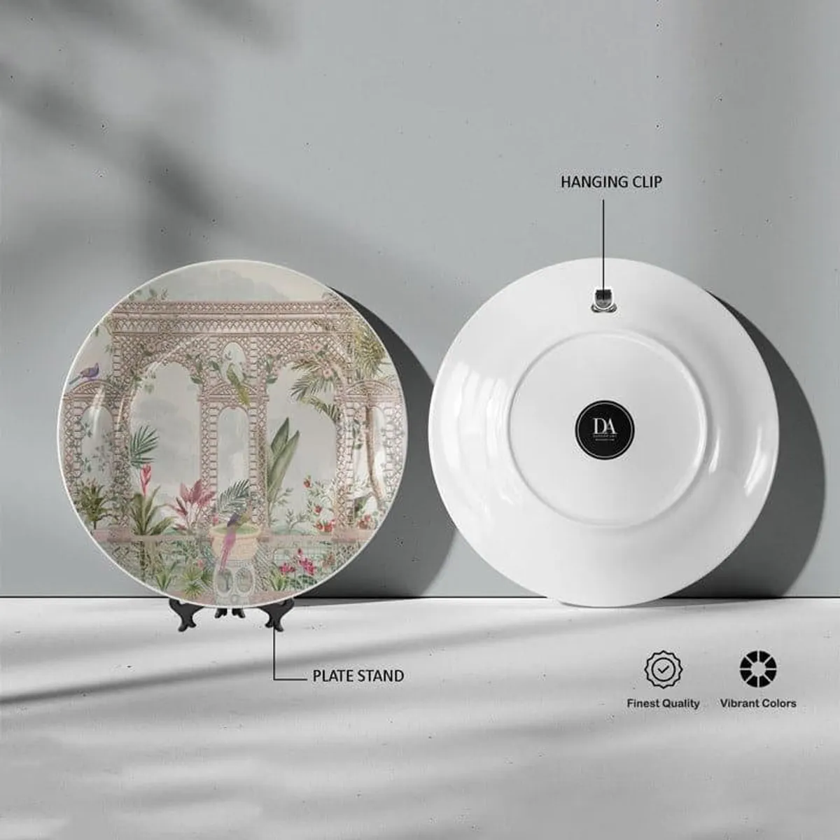 Front and back view of round wall plate with hanging clip