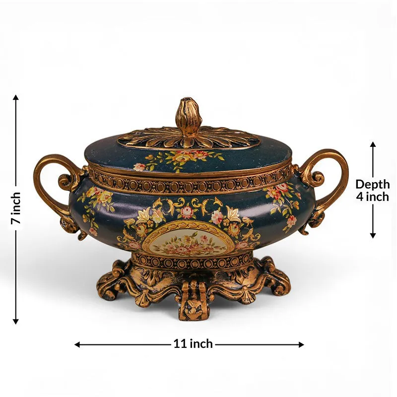 Closed blue and gold storage box shown front-facing with ornate handles