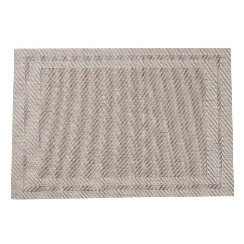 Close view of the brown table mat showing its subtle textured pattern and border