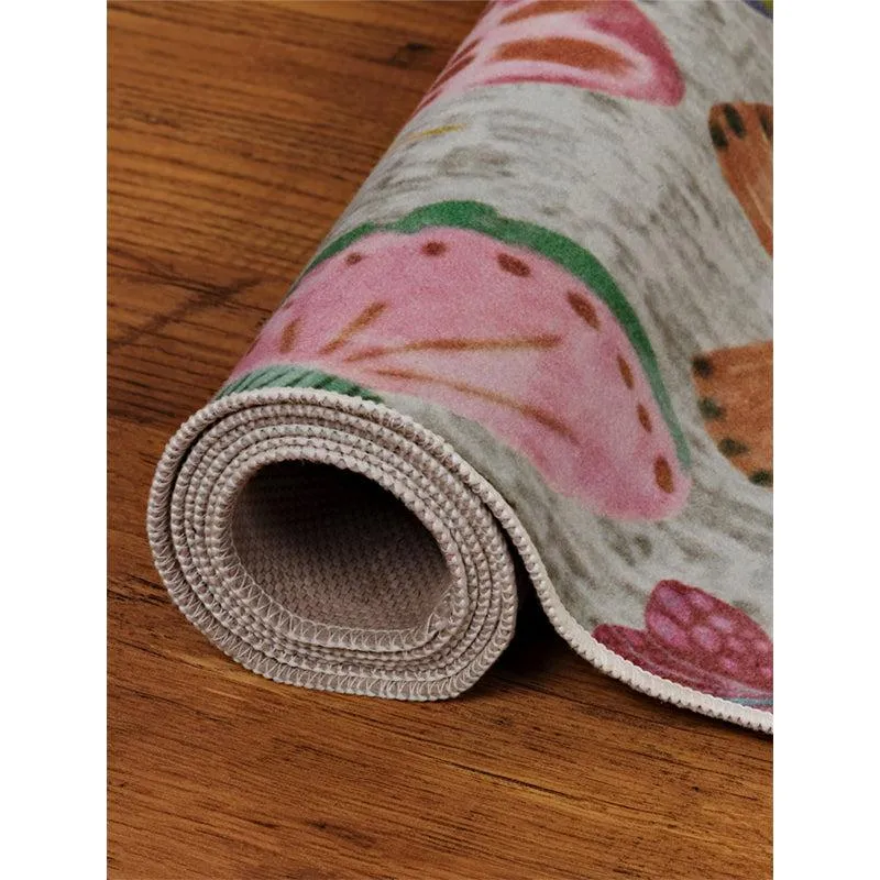 Rolled edge of the butterfly print carpet showing the underside