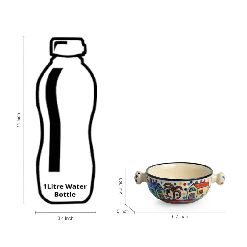Colourful ceramic serving bowl shown beside a water bottle for a size reference.
