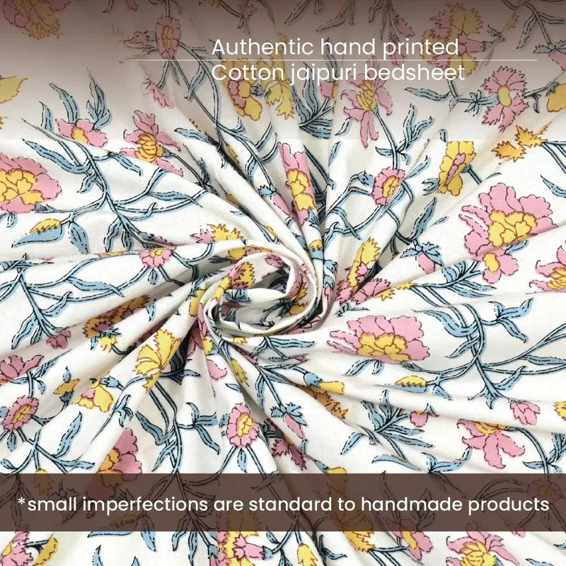 Close-up of floral cotton fabric in white, blue, pink and yellow tones