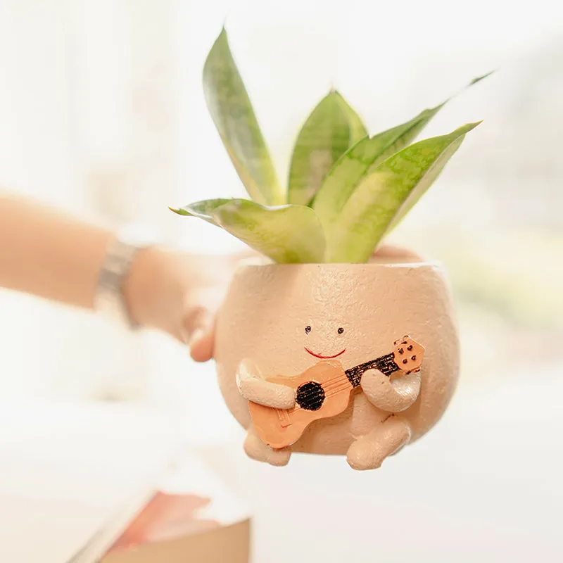Guitarist Resin Planter media 4