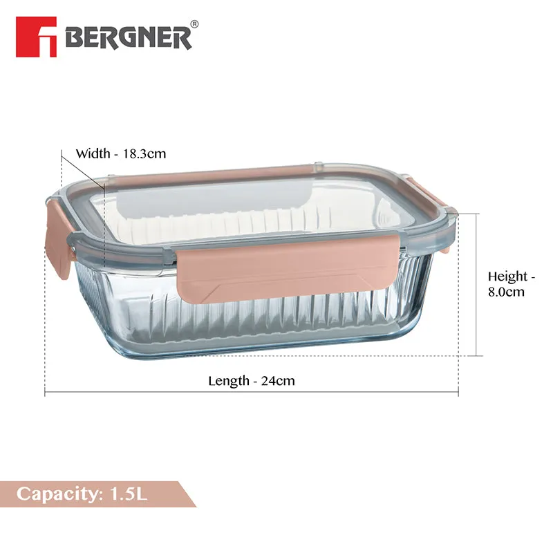 Transparent rectangular glass lunch box with peach lid shown with its dimensions.