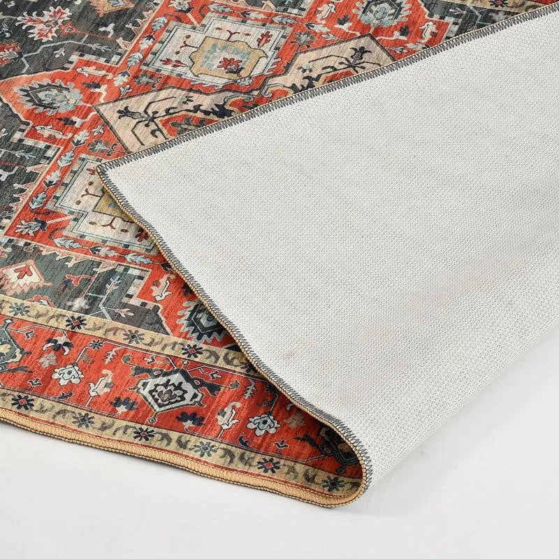 Corner of the carpet folded to show the light-coloured anti-skid backing