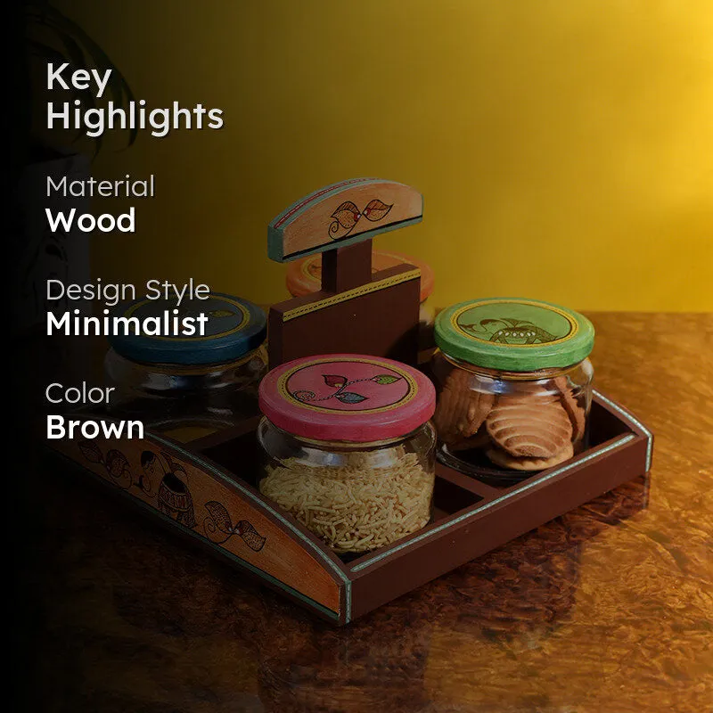 Nira condiment set styled on a table against a warm yellow background.