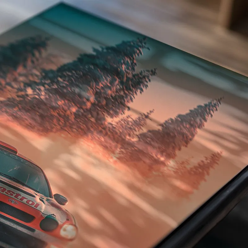 Close-up of rally car poster with misty forest backdrop