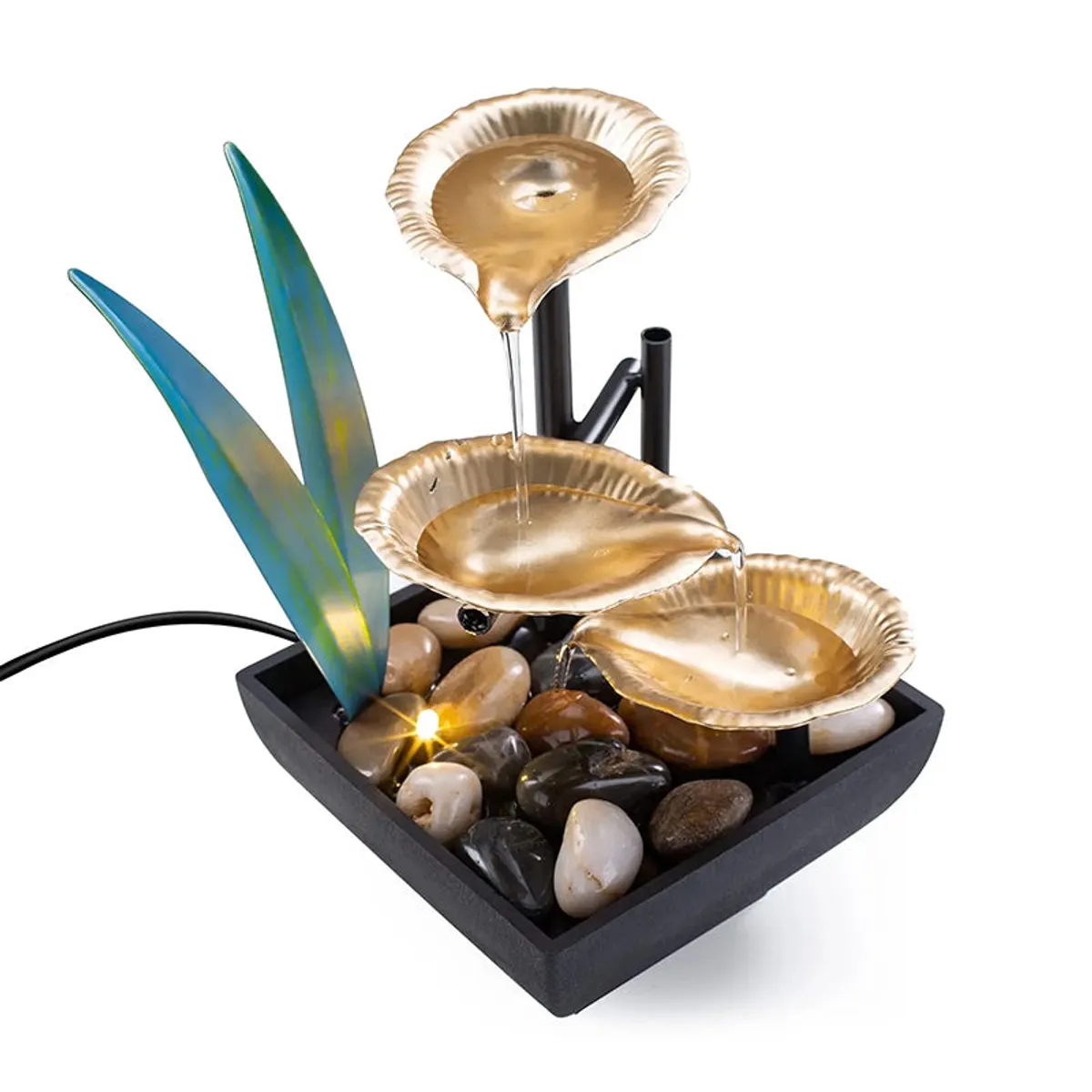 Close-up of the gold lily pad fountain with pebbles and blue leaf accents