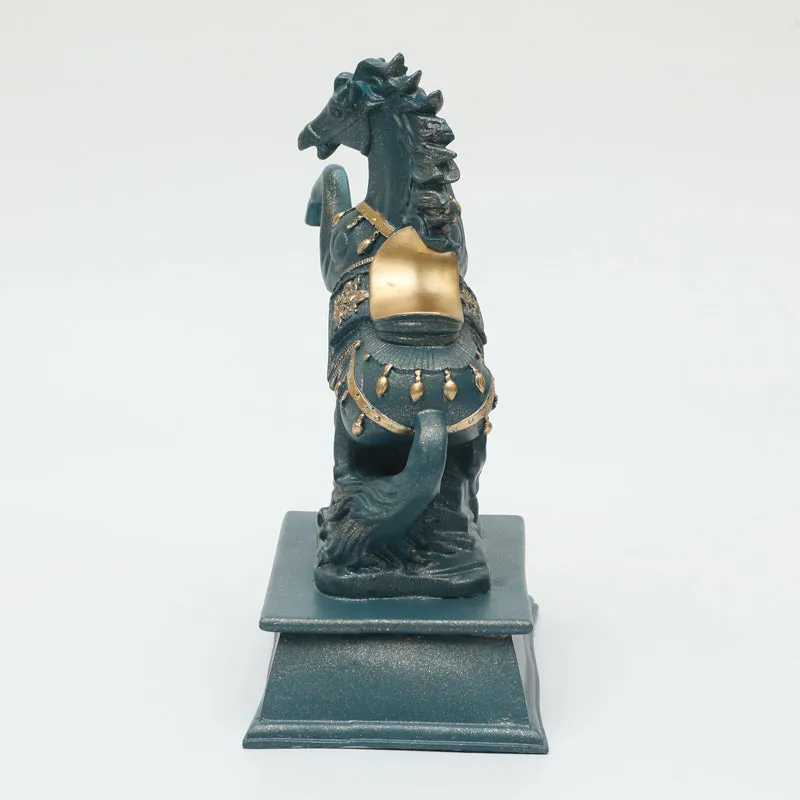 Rear view of a grey horse showpiece showing gold saddle detail and pedestal base