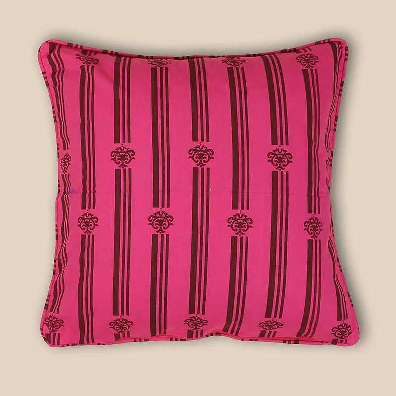 Reverse view of a pink cushion cover with vertical brown stripes and motifs.